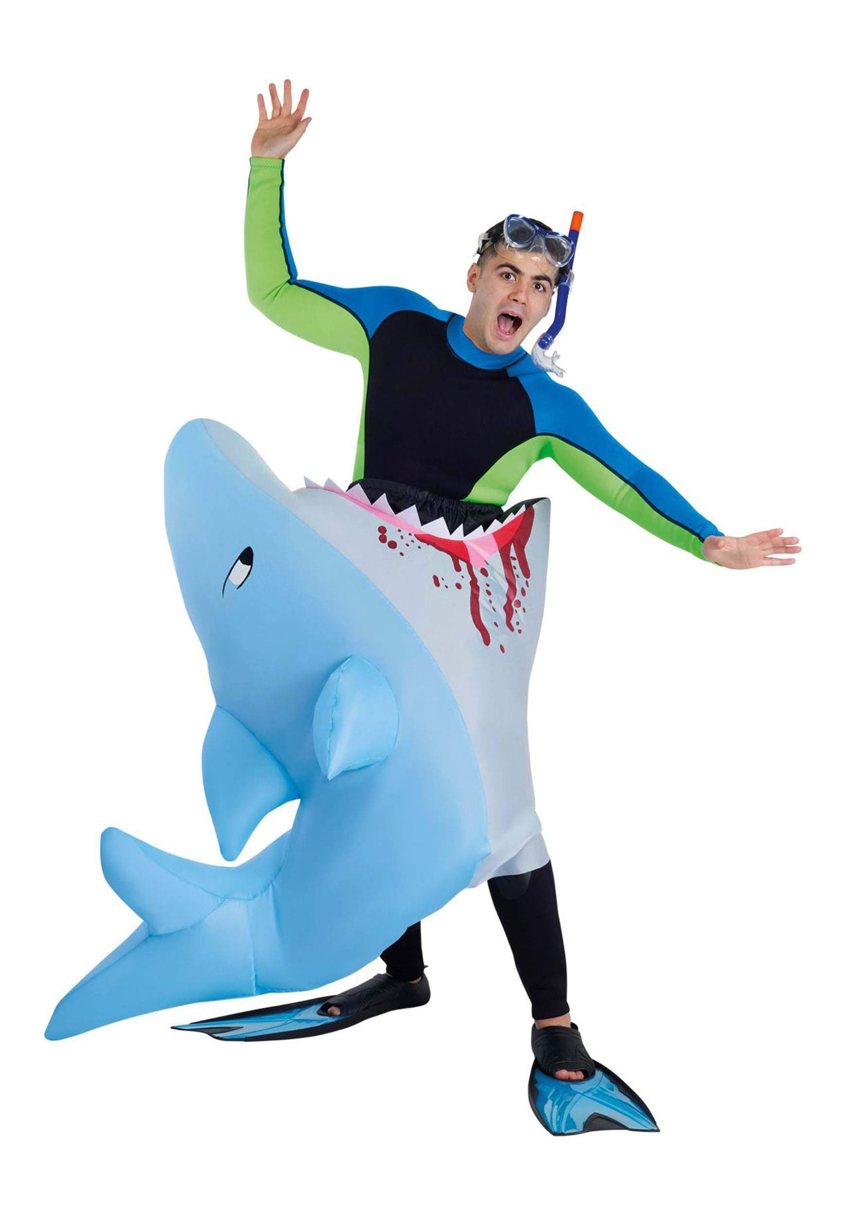 19.) Adult Man Eating Inflatable Shark